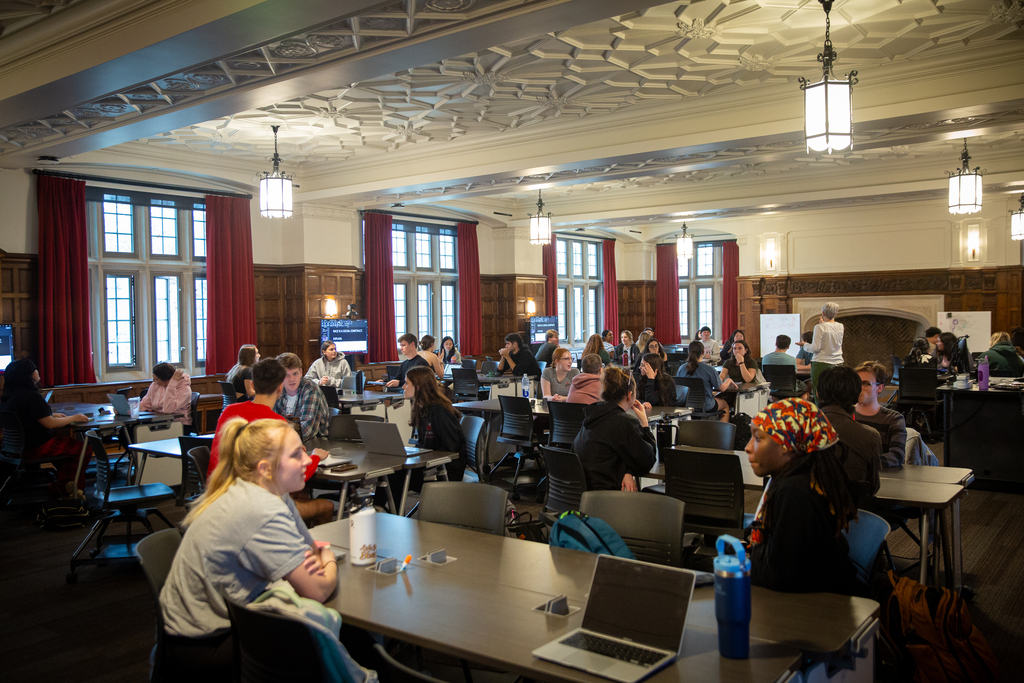 A large conference room full of attendees.