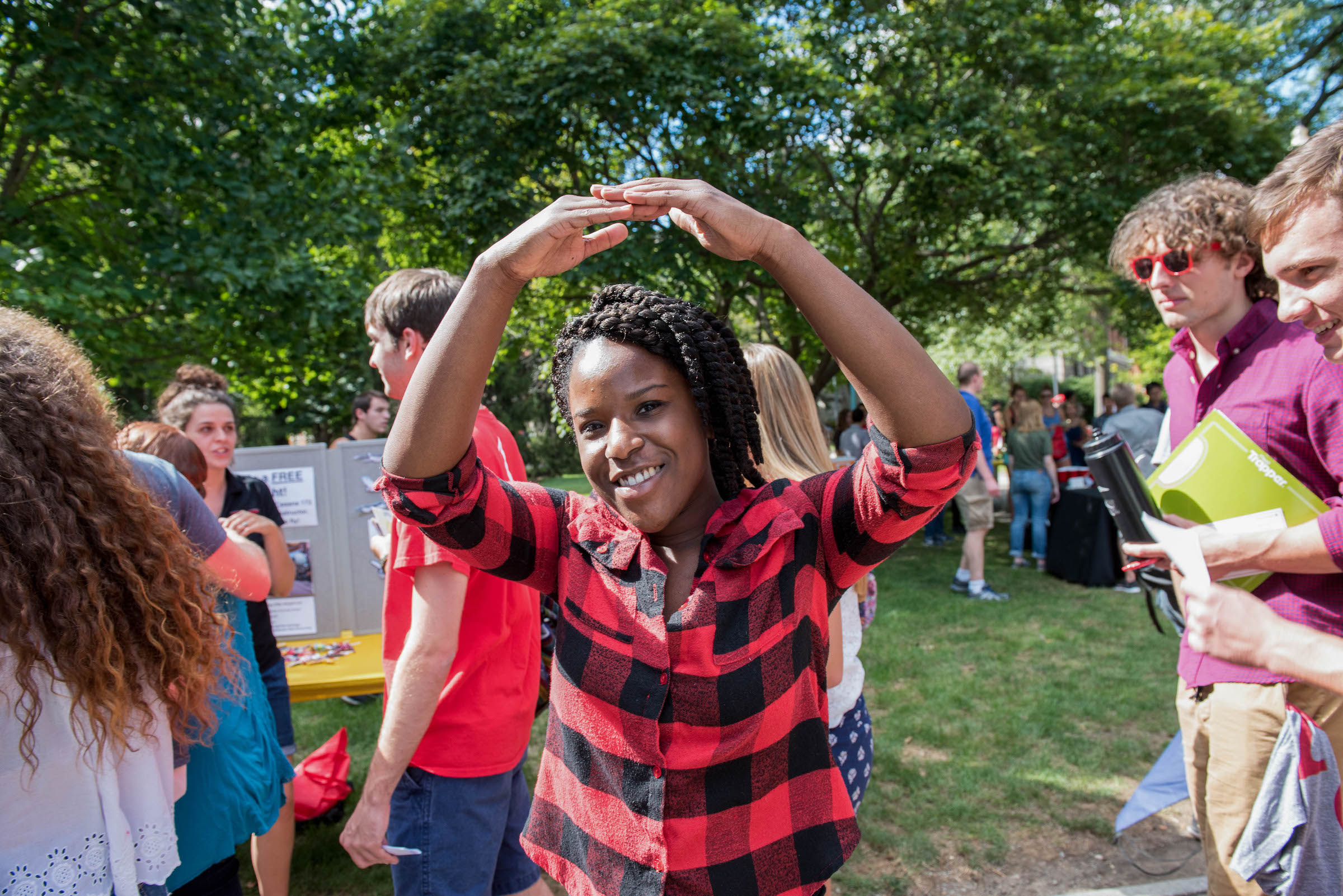 A female student makes the Block O.