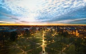 Aeriel view of the oval at The Ohio State University under a cloudy sky at dawn.